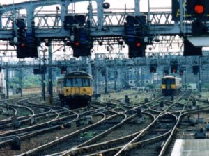 Suburban electric units on approach to a major city terminal