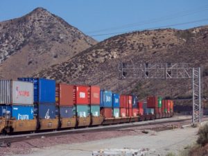 Intermodal train passing through Cajon Pass in California by Doug Wertman from Rogers, Ark. (CC BY 2.0)